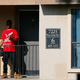 A man stands outside a unit at the Ivy Apartments in Dallas, where the first confirmed U.S. Ebola-virus patient was staying with family members, on Oct. 1, 2014.
Tom Pennington/Getty Images